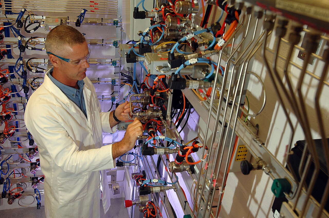 Researcher at laboratory equipment